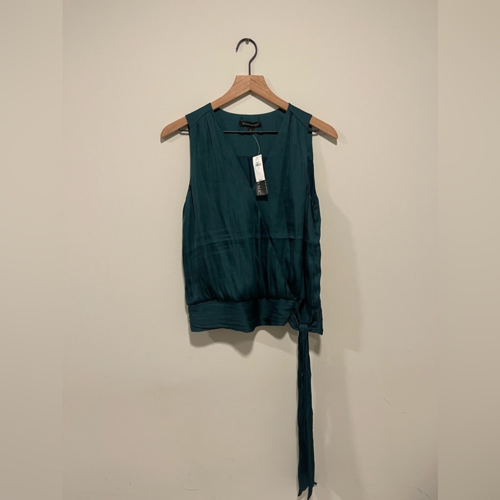 Green Sleeveless top with tie.